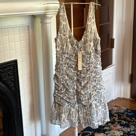 She + Sky Dresses & Skirts - She + Sky snakeskin gathered dress. NWT.
